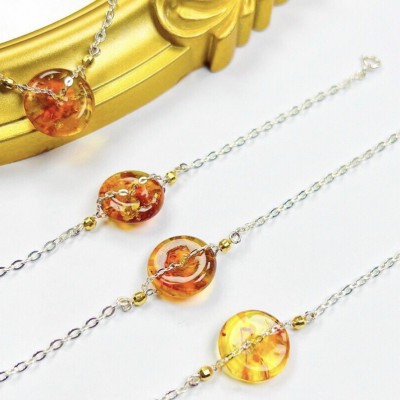 LÁCH TAY ĐỒNG ĐIẾU HỔ PHÁCH AMBER DÂY BẠC TA