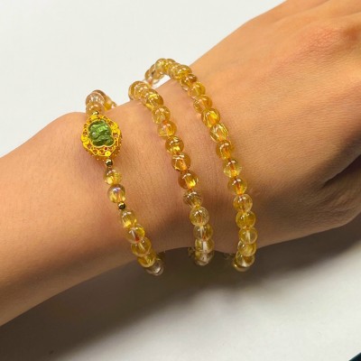 Vòng tay thạch anh tóc vàng mix charm vàng Tourmaline